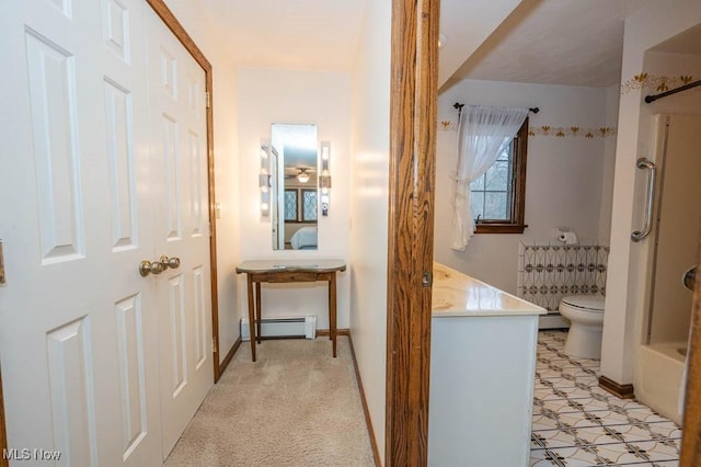 hall featuring light carpet and a baseboard radiator