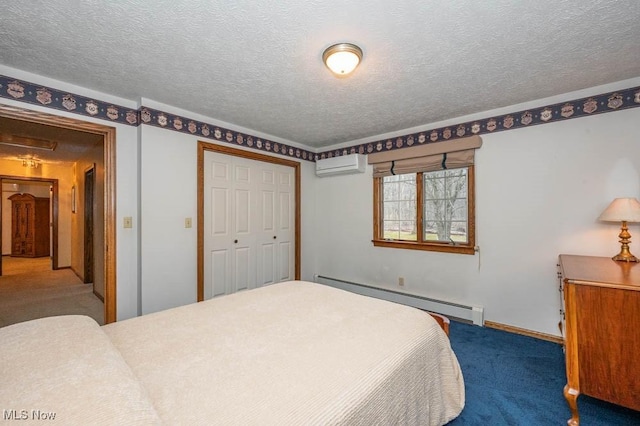 carpeted bedroom with a textured ceiling, an AC wall unit, baseboard heating, and a closet