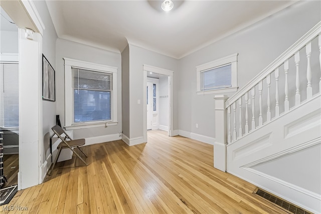 foyer with hardwood / wood-style flooring