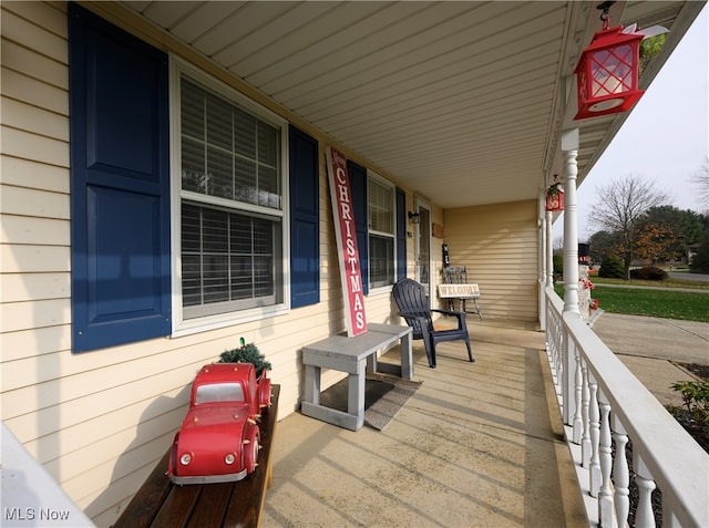 wooden deck featuring covered porch