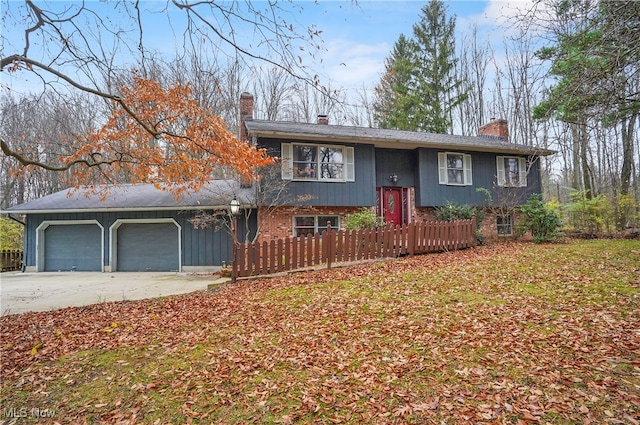 split foyer home featuring a garage