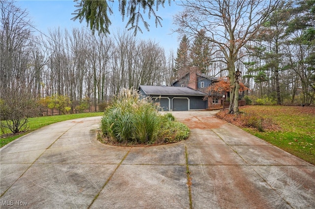 view of property exterior with a garage