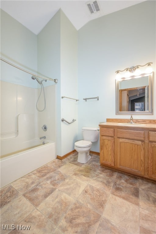 full bathroom featuring vanity, toilet, tub / shower combination, and vaulted ceiling