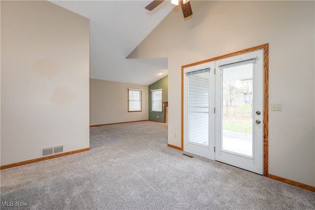 interior space featuring ceiling fan and high vaulted ceiling