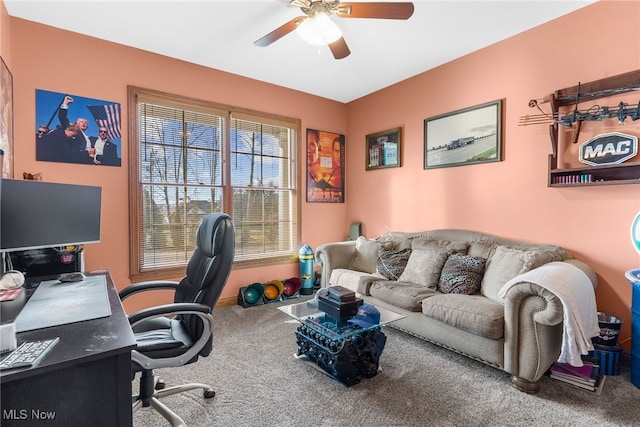 office space with carpet and ceiling fan