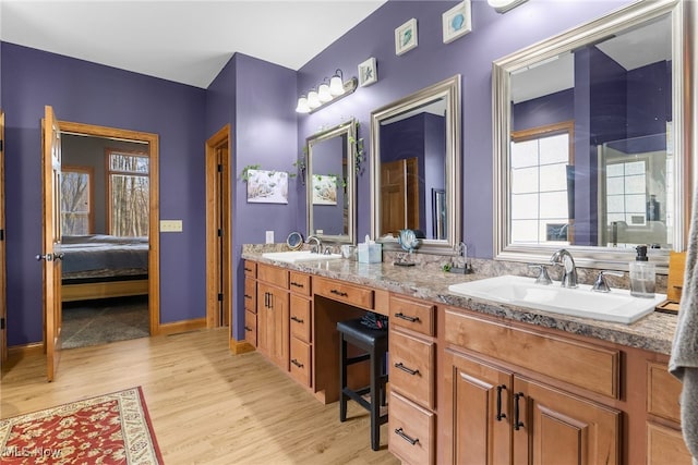 bathroom featuring vanity and wood-type flooring