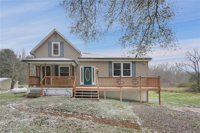 view of front of house with a porch and a wooden deck