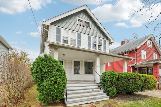 view of property with covered porch