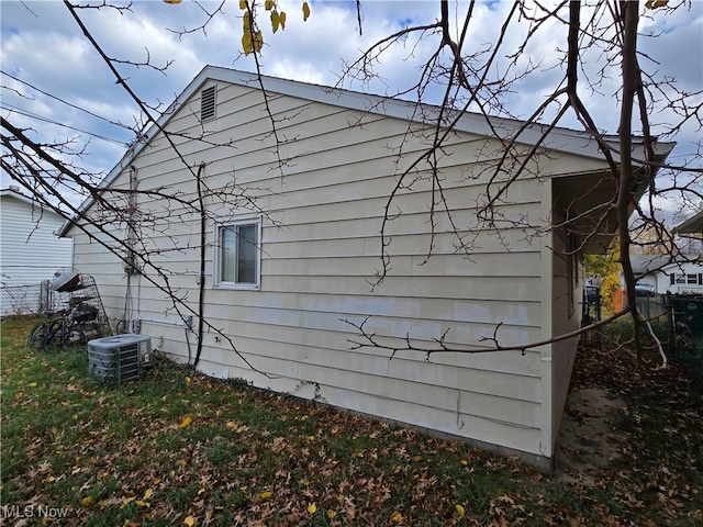 view of home's exterior with cooling unit