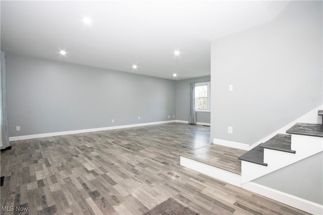 unfurnished room with light hardwood / wood-style floors