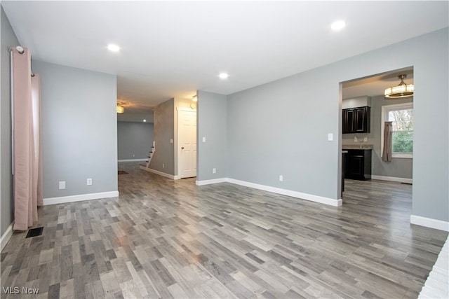 interior space with hardwood / wood-style floors