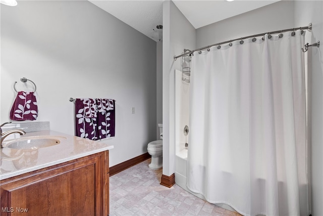 full bathroom with vanity, shower / bath combination with curtain, and toilet