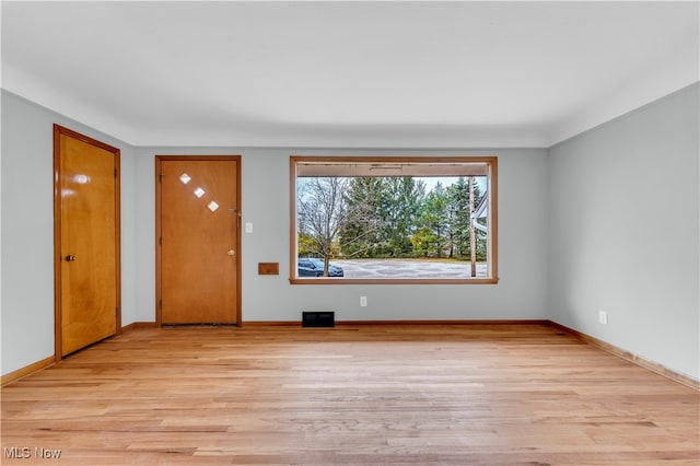 empty room featuring light wood-type flooring