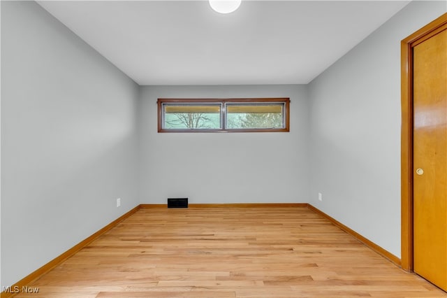 empty room featuring light hardwood / wood-style floors