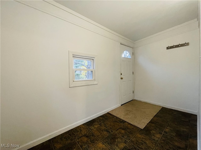 foyer entrance with ornamental molding