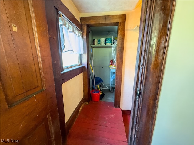 hall with dark hardwood / wood-style floors