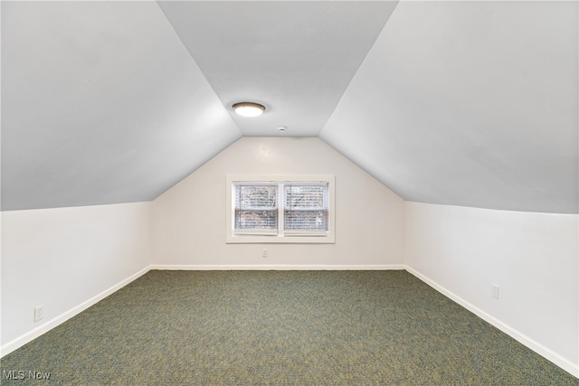 bonus room featuring carpet and lofted ceiling