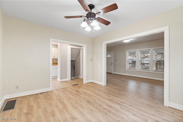 interior space with light hardwood / wood-style floors and ceiling fan