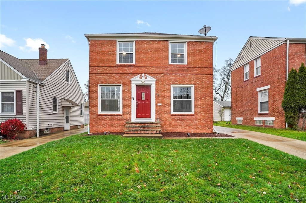 view of front of house with a front lawn