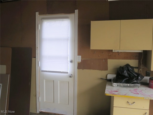 kitchen featuring cream cabinetry