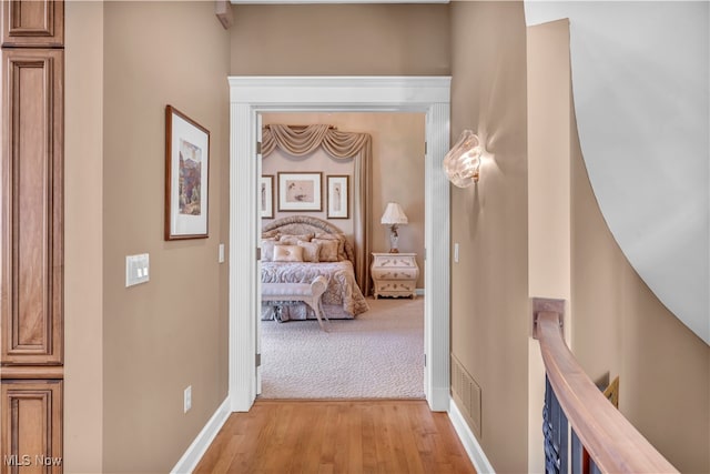 hallway featuring light hardwood / wood-style floors