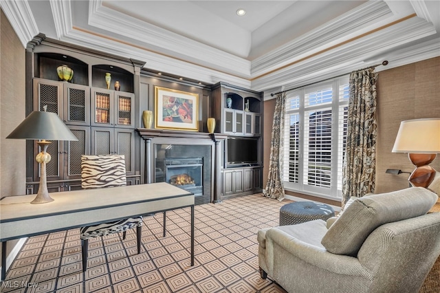 office featuring ornamental molding and a tray ceiling