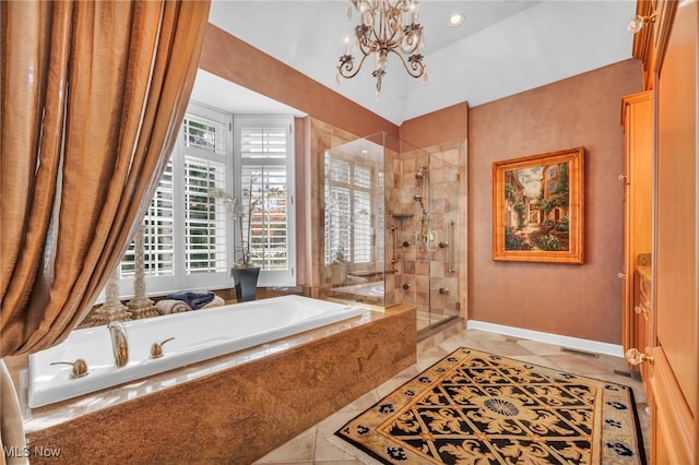 bathroom featuring tile patterned flooring, an inviting chandelier, and shower with separate bathtub