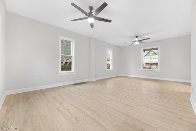 unfurnished room featuring light hardwood / wood-style flooring and ceiling fan