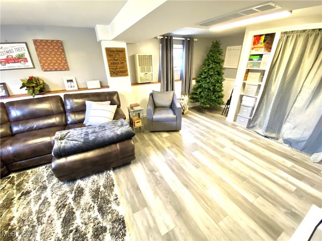 living room with light hardwood / wood-style floors