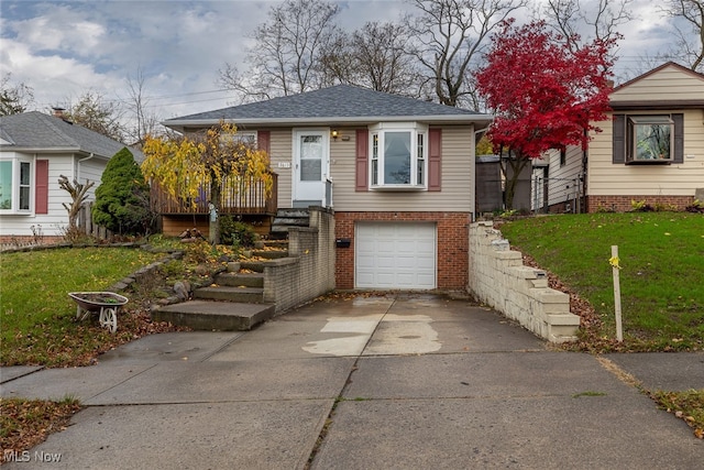 bungalow-style house featuring a front yard and a garage