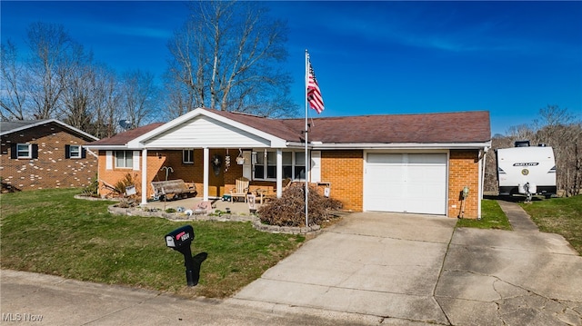 single story home featuring a front lawn and a garage