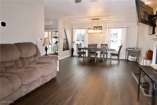 living room with dark hardwood / wood-style floors