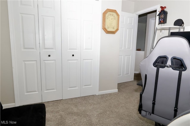 workout room with light carpet