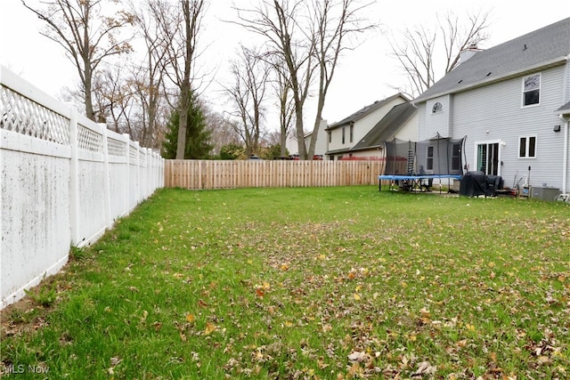 view of yard featuring a trampoline