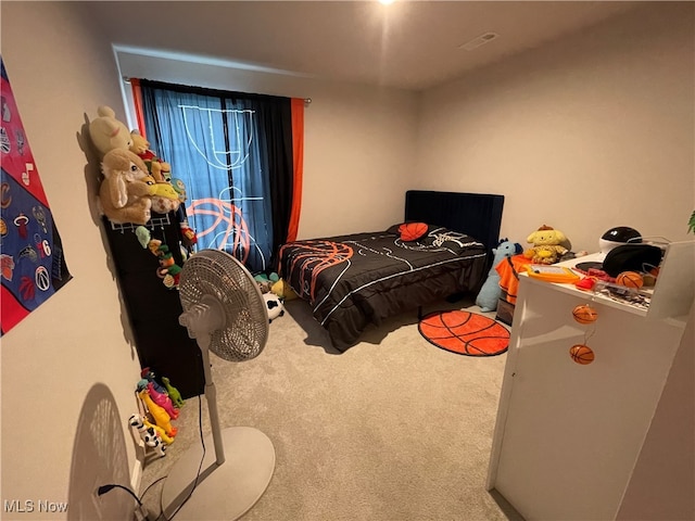 bedroom featuring carpet flooring