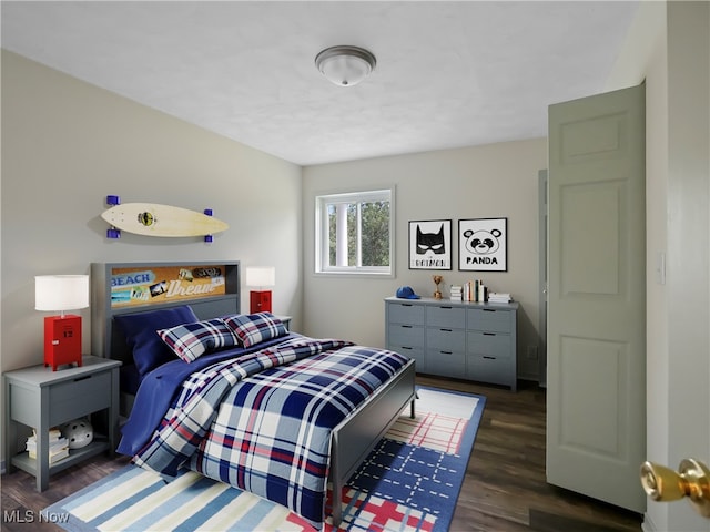 bedroom featuring dark hardwood / wood-style floors