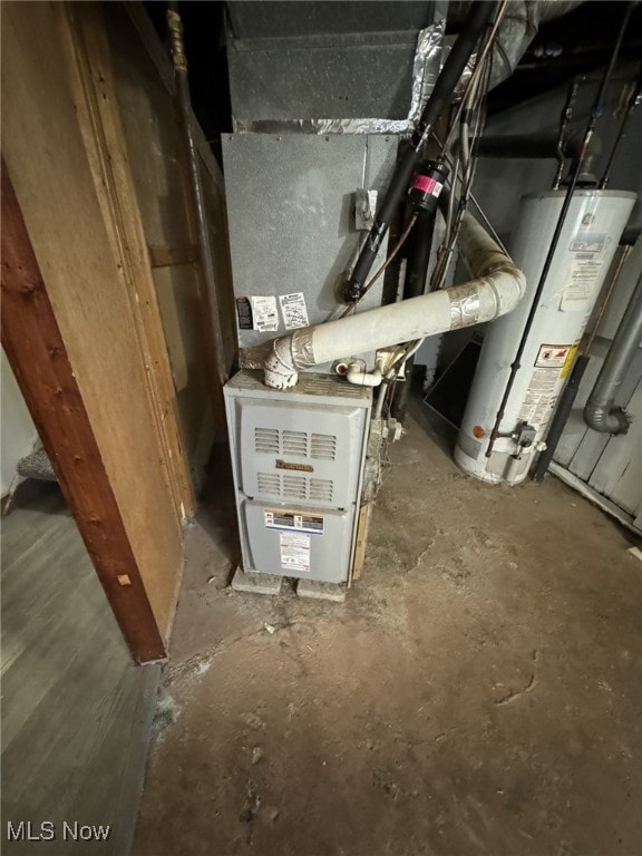 utility room with gas water heater