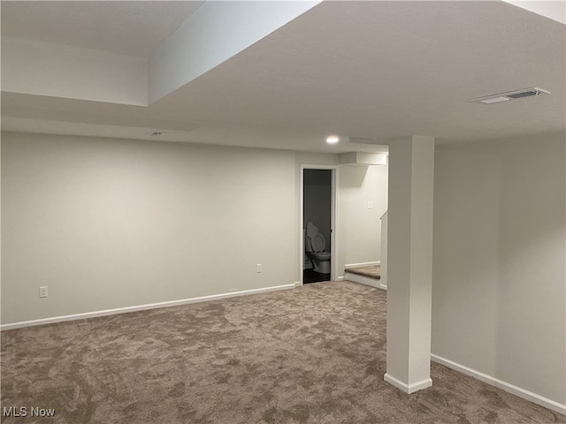 basement with carpet flooring