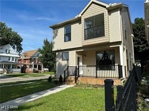 view of front of house featuring a front lawn