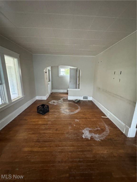 interior space with dark hardwood / wood-style flooring