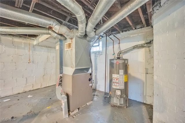 utility room with heating unit and water heater