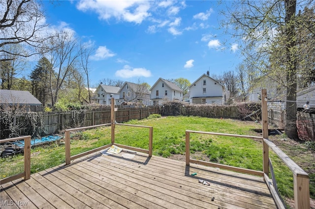 wooden deck with a yard