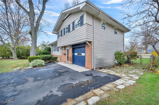 view of home's exterior with a garage