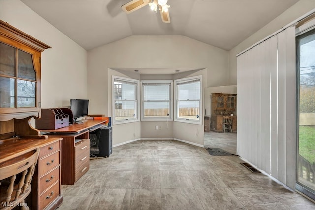 home office featuring ceiling fan and lofted ceiling