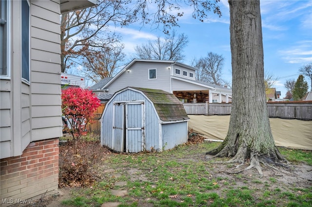 exterior space featuring a storage shed and a patio