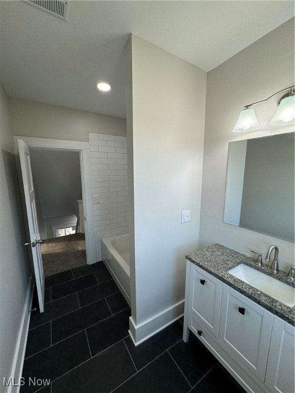 bathroom featuring vanity and tile patterned floors