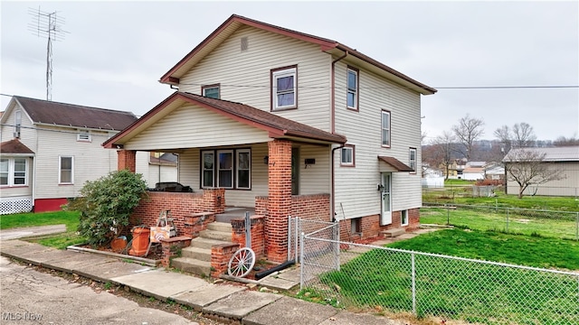 view of property with a front yard and a porch