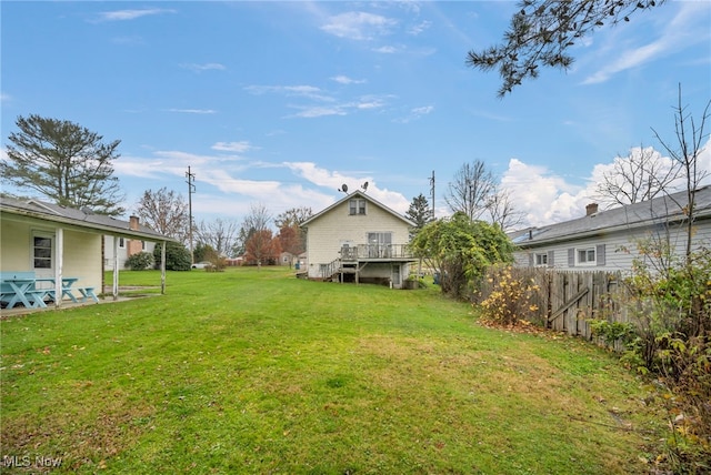 view of yard with a deck