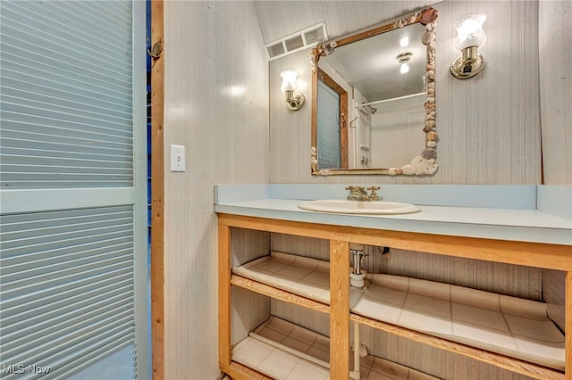 bathroom featuring tile patterned floors and sink