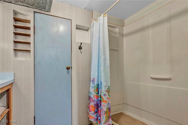 bathroom with a shower with shower curtain